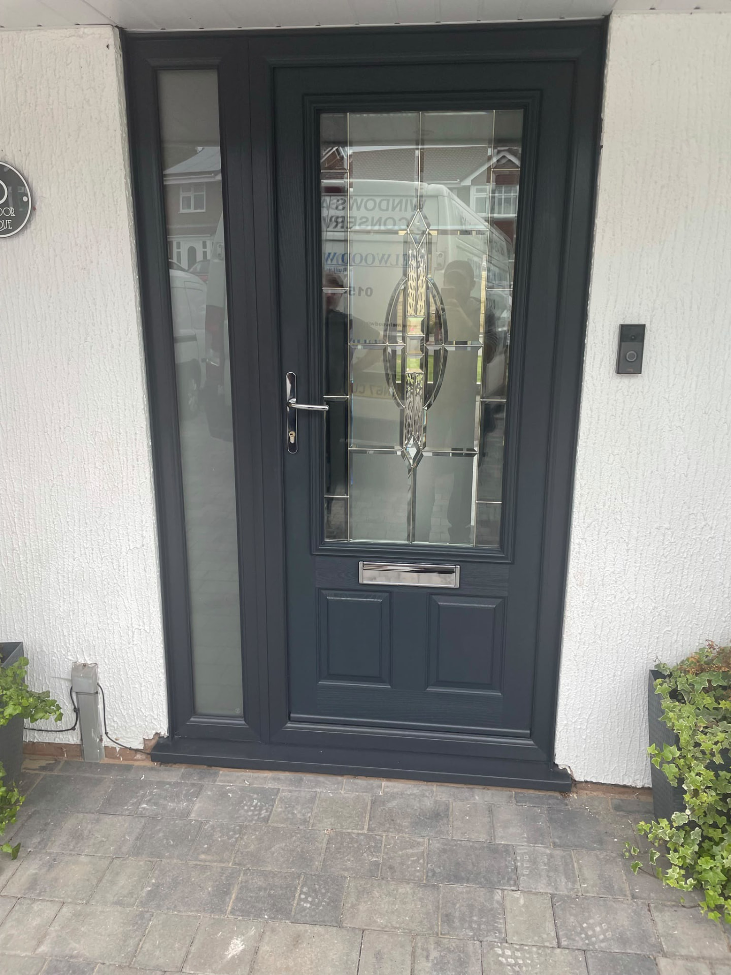 Anthracite grey composite front door with decorative glazing fitted by Draycote Windows