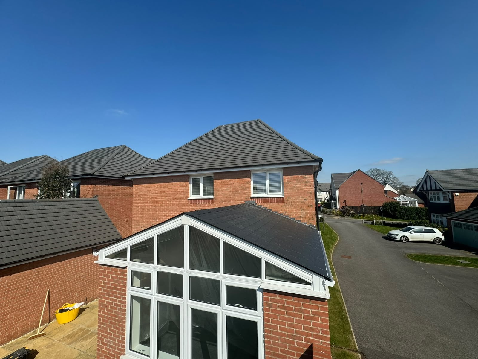 Insulated tiled warm roof fitted to a gable-end conservatory