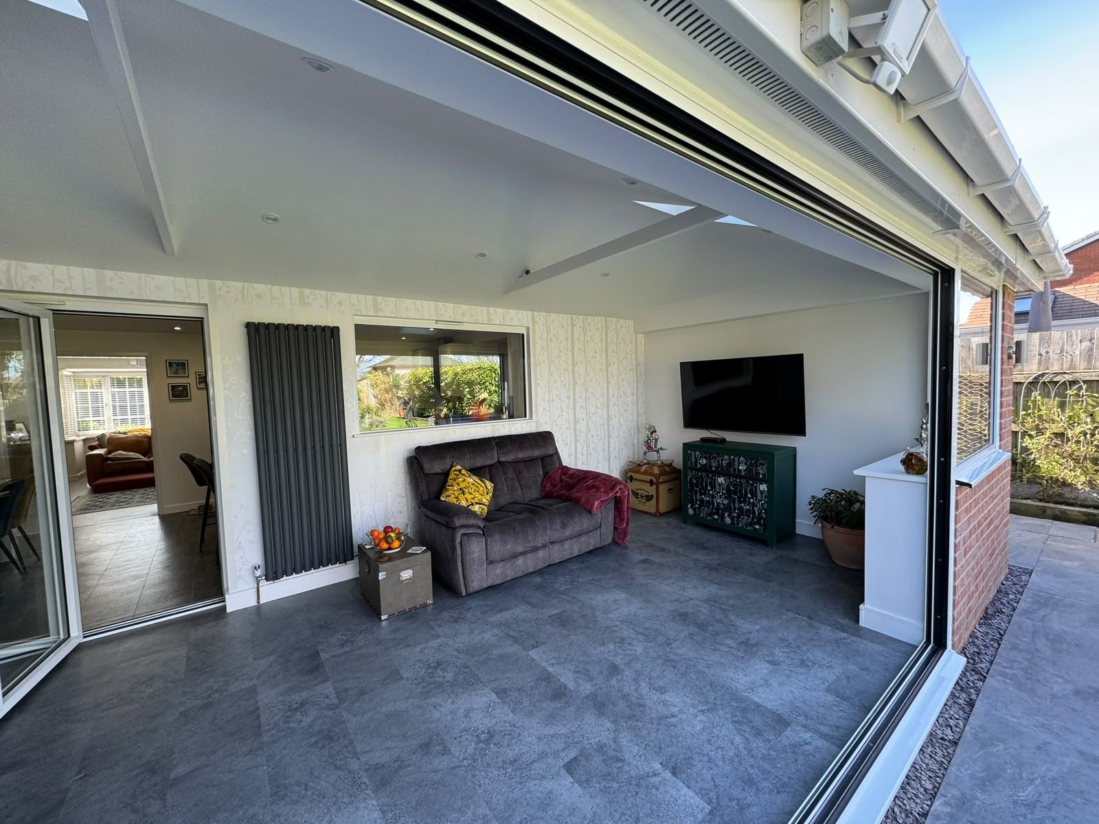 Open-plan living space inside a rear extension built by Draycote Windows