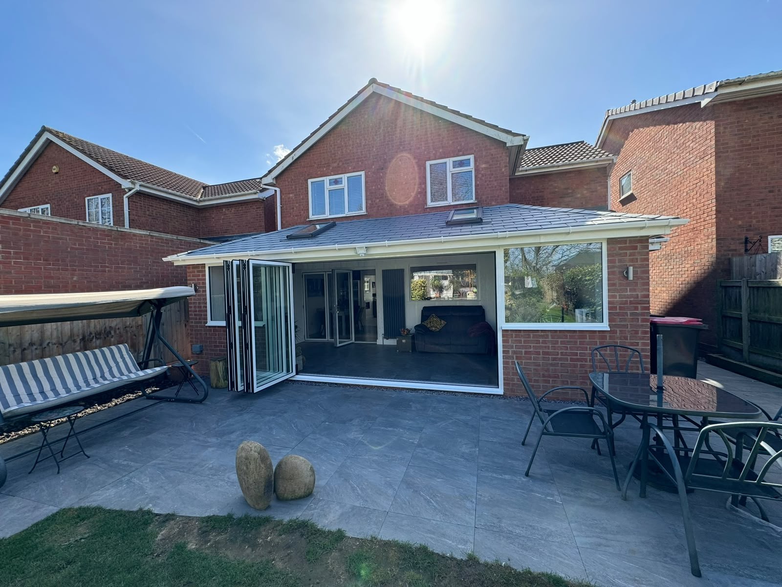 Conservatory converted to a year-round room with an insulated tiled warm roof