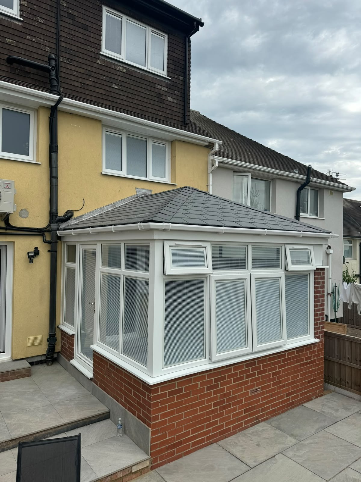 Victorian conservatory fitted with an insulated tiled warm roof